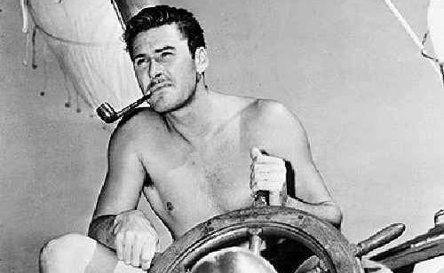 AT THE HELM: Captain Errol Flynn. AT THE HELM: Captain Errol Flynn.